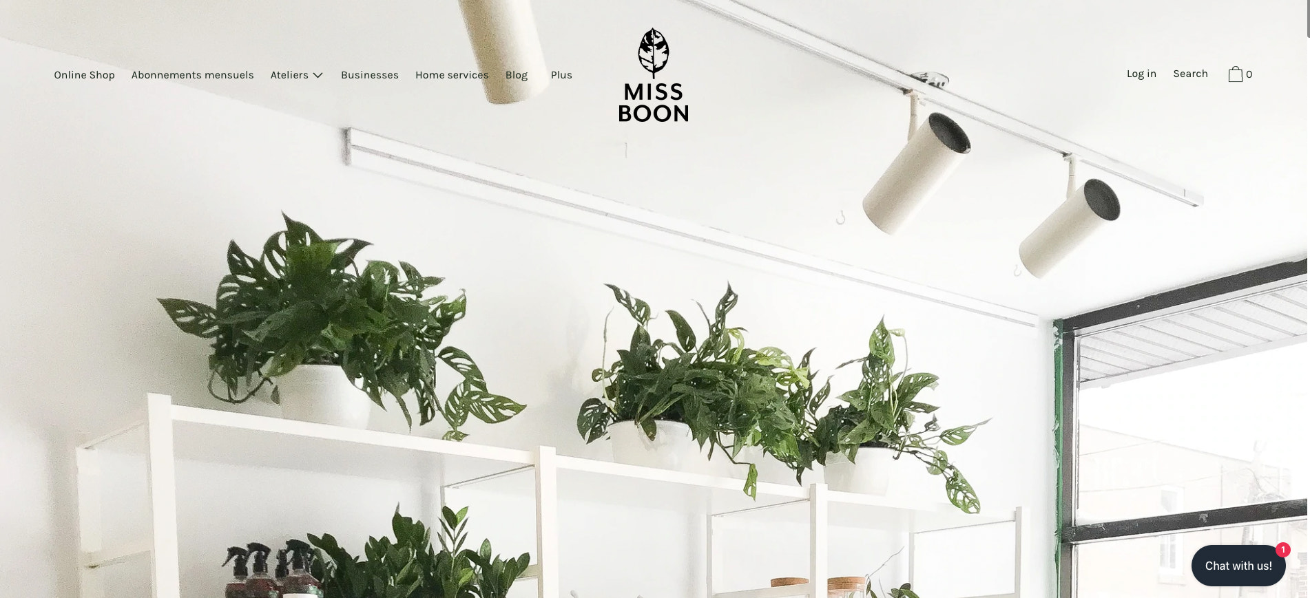 A screenshot of the Miss Boon homepage featuring a plant-filled hero image